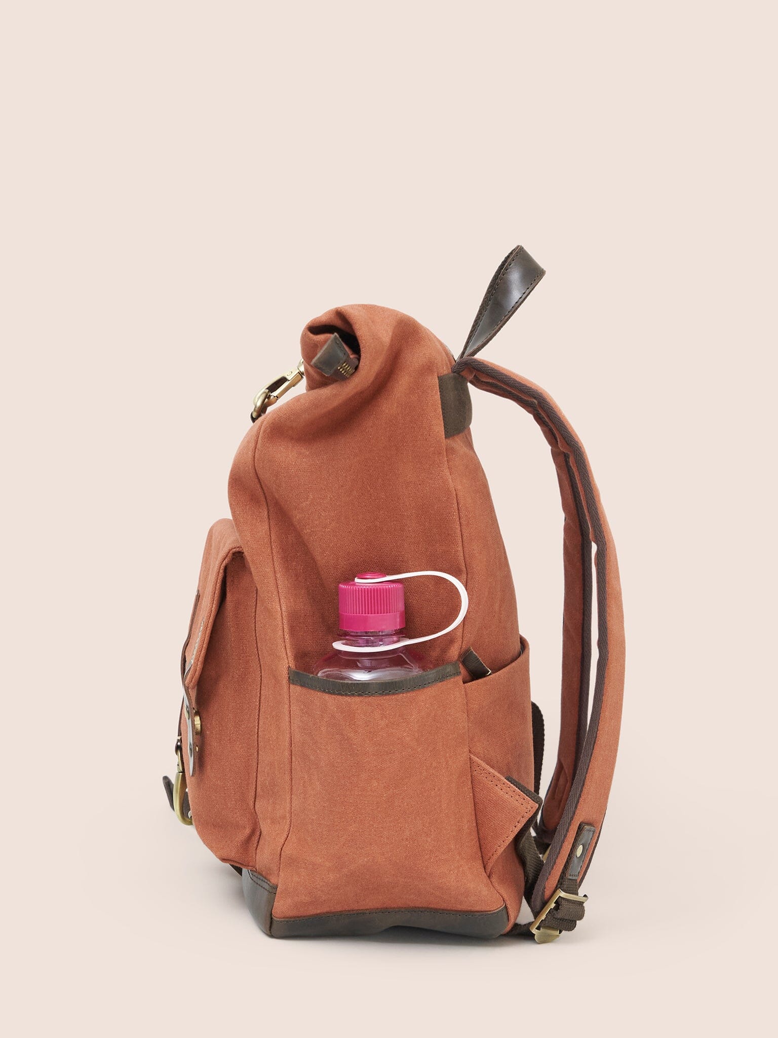 Sri Lanka Waxed Cotton Roll Top Clip Backpack in Orange - Image 4
