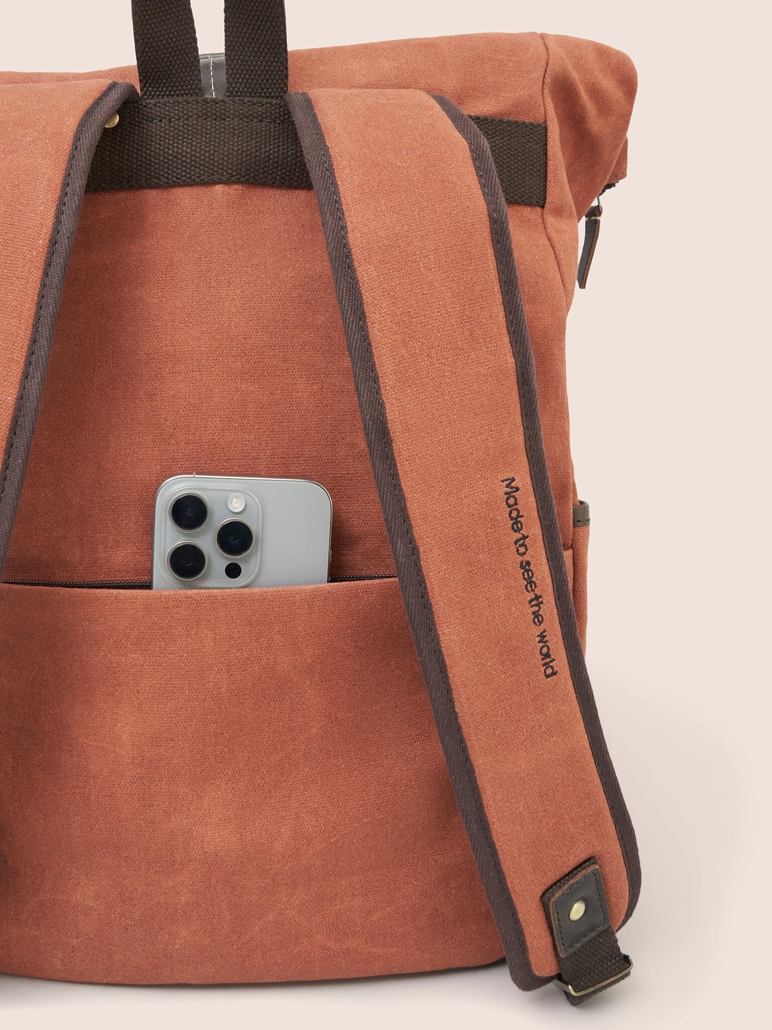 Sri Lanka Waxed Cotton Roll Top Clip Backpack in Orange - Image 5